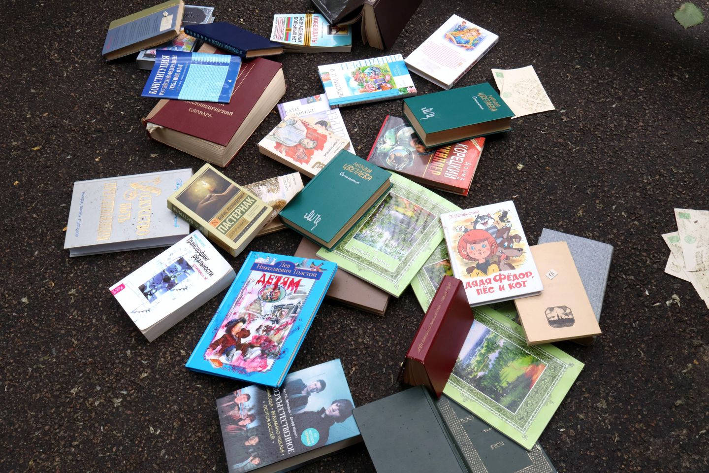 A pile of books on the street